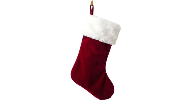 Red velvet christmas stocking with white faux fur trim, isolated on transparent background
