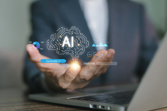 Businessman hand holding glowing artificial intelligence brain hologram with data charts over laptop keyboard. Futuristic concept of AI, machine learning, and innovative business technology generation