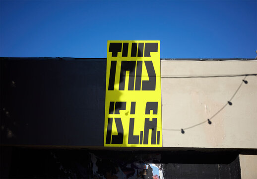 Mockup Template of Vertical Sign on Los Angeles Building Parapet