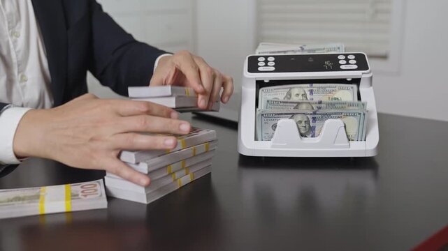 Banker counting money in office. Financial control. Money operation in bank office. Business man in money counting process. Banker and currency. Office worker counting cash. Banking process with cash.