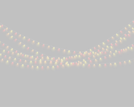 Christmas string lights in alternating warm red and yellow colors hang gracefully. The bulbs emit a soft glow with a slight halo effect on a dark background.