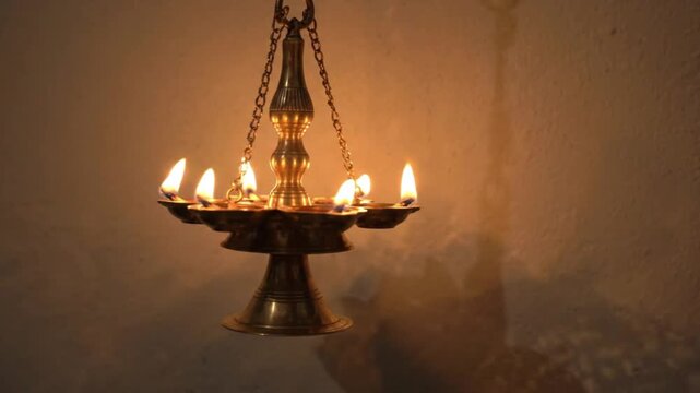 Traditional Brass Hanging Oil Lamp Diya Diwali Background with Copy Space 4K Seamless Loop