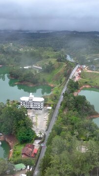 Puerta de Oro, Colombia's Largest Solar Photovoltaic Park with Massive Solar Panel Arrays. Establishing Shot. Aerial View. Vertical Video.
