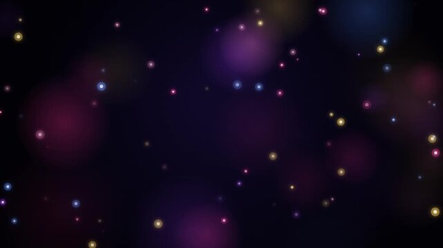 Abstract background animation featuring colorful floating light particles in dark space.