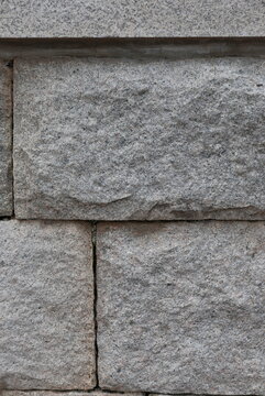 Cut granite stone block wall texture and masonry