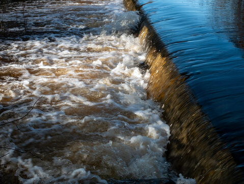 Rushing Floodwater in Hupisaaret City Park Oulu During Autumn
