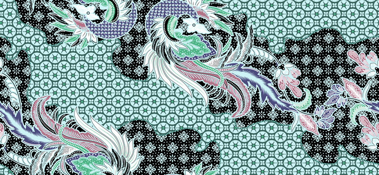 Traditional seamless Indonesian batik pattern with phoenix bird motif in shades of mint green and black