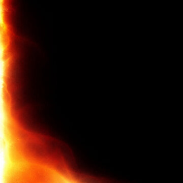 Warm amber film burn light leak overlay on black