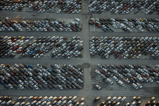 Aerial view of the Pick-n-Pull salvage yard featuring rows of organized scrap vehicles and parked cars in Newark, California, United States.