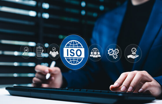 ISO certification and quality assurance standard concept. Businesswoman pointing at ISO certification icons, symbolizing global standards, compliance, excellence across operations, certified quality,