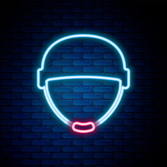 Fototapeta premium Glowing neon line Military helmet icon isolated on brick wall background. Army hat symbol of defense and protect. Protective hat. Colorful outline concept. Vector