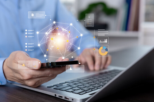 Global connectivity and data analytics concept with a digital globe, connected nodes, charts and information panels displayed above a handheld mobile device.