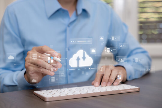 Cloud computing concept with upload and download arrows, connected servers and application panels on a virtual interface operated by a professional using a stylus.