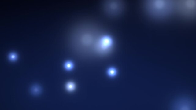 Sparkling particles drift and swirl against a dark blue gradient backdrop sparkles glitter shimmer luminosity illumination
