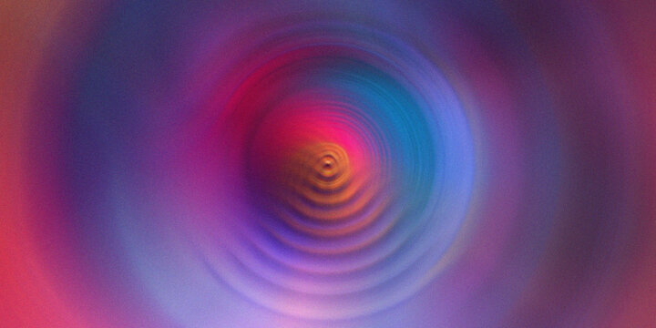 Vibrant rainbow color circles with radial motion blur create dynamic hypnotic swirl effect.