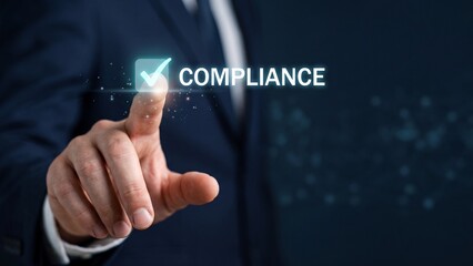 Obraz premium Businessman interacting with digital policy compliance and security text interface, hand close up concept