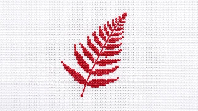 Red Fern Leaf Cross Stitch Embroidered on White Fabric Background Handcrafted Needlework Art Minimalist Graphic for Hobby Craft or DIY Blog