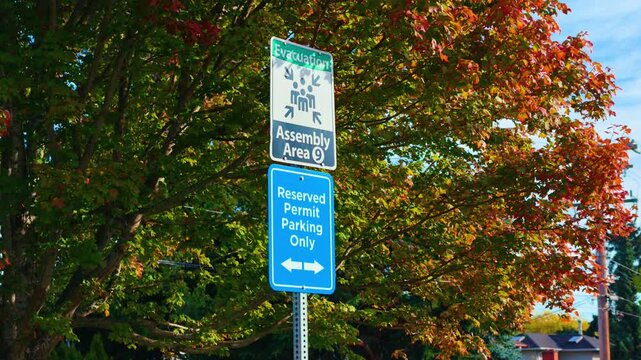 Emergency Evacuation Assembly Area and Reserved Permit Parking Signs