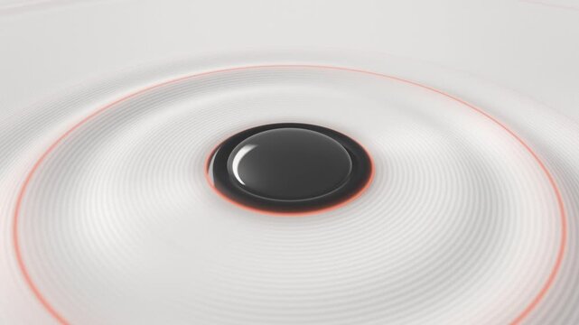 Seamless loop of black round button sending red glowing ripple waves across a white surface