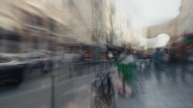 Disoriented pov of walking through a bustling paris street