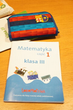 School mathematics workbook for third grade students with a FC Barcelona pencil case on a desk