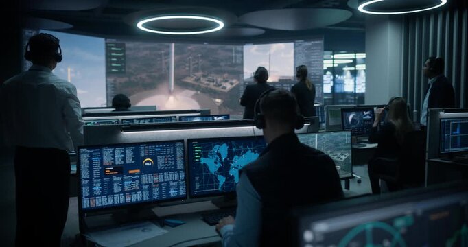 Monitoring Control Room. Aerospace Engineers Track Telemetry, Radar and Trajectory Data, Then Applaud Reusable Rockets Landing After Modern Launches for Satellite Delivery, Cargo and Science Missions.