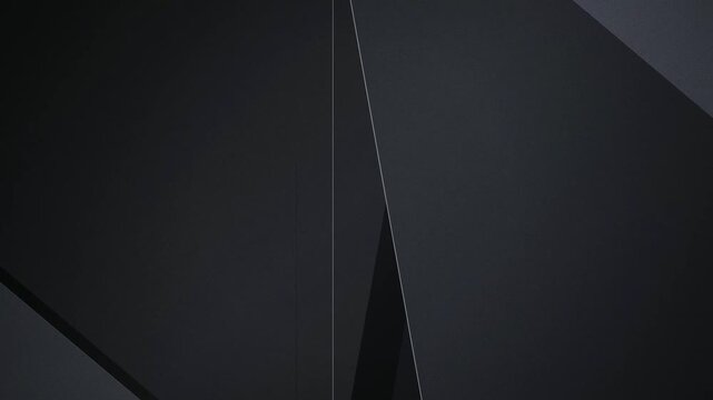 Dark charcoal geometric planes overlapping seamless loop motion