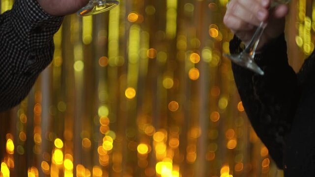 Dating, celebrating New Year, anniversary or birthday. Woman and man clink glasses of champagne during festive event