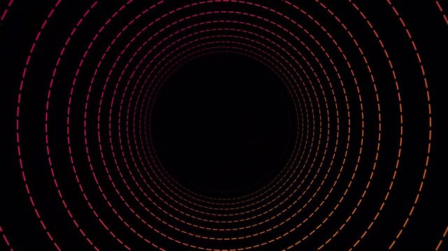Abstract tunnel of glowing dashed circular lines with gradient color transition on black background for motion graphics