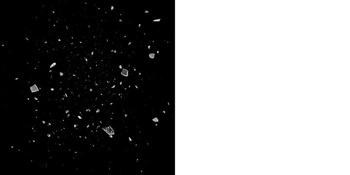 Glass shattering particle effect with hundreds of tiny fragments, scattered shards and fine debris, high contrast breaking glass texture on black background for cinematic overlays