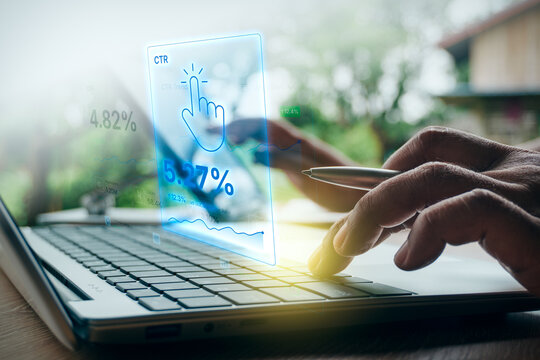 Man typing on laptop with digital CTR and conversion rate marketing analytics interface in outdoor setting, concept of digital marketing campaign, click-through rate, and performance metrics.