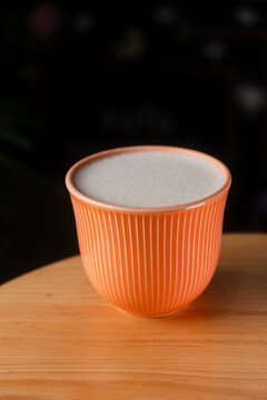 Autumn Raf Coffee in Orange Cup