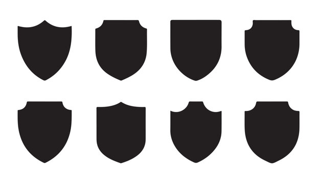 Simple black shield shapes in various styles for graphic design and icons.