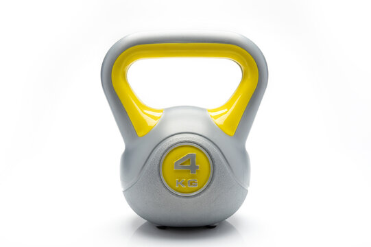Kettlebell with 4 kilogram on a white background.Grey yellow colors.