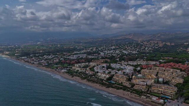 Hyperlapse of Elviria Beach, Marbella, Costa del Sol, Malaga, Andalucia, Spain with Dramatic Storm Clouds