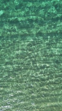 Top View of Clear Turquoise Water Surface Texture