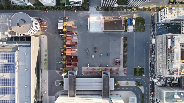 Aerial view of Messe Frankfurt exhibition grounds with rows of containers and parked cars in Frankfurt am Main, Hessen, Germany.