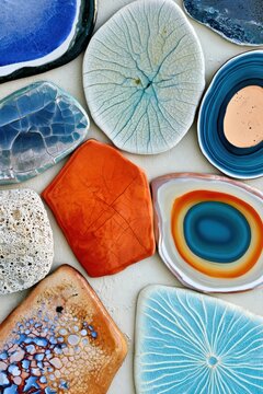 Colorful ceramic tiles and agate slices flat lay composition for home decor background poster and craft product design