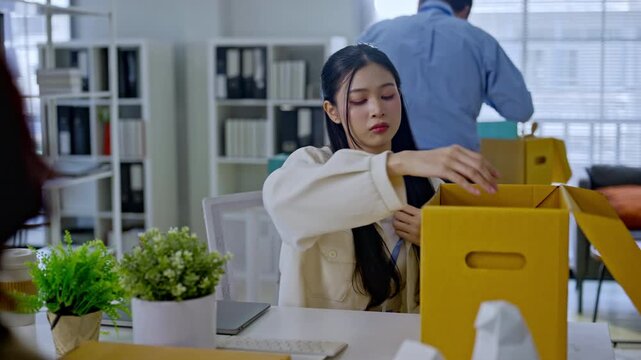 businesswoman packing into cardboard box due to job layoff,worker replaced by AI automation,career retirement,ai disruption and modern technology,Digital Disruption,Document Management Data System