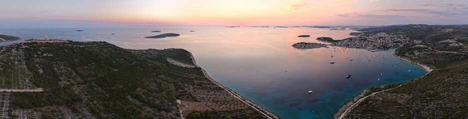 Panoramic aerial view of Primosten coastline and Gaj hill during colorful sunset in Croatia © ventura