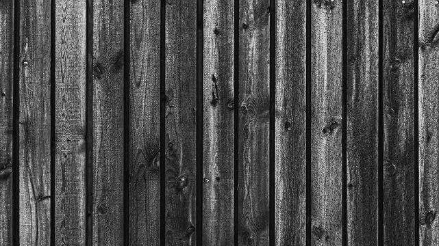 Dark wooden fence texture pattern
