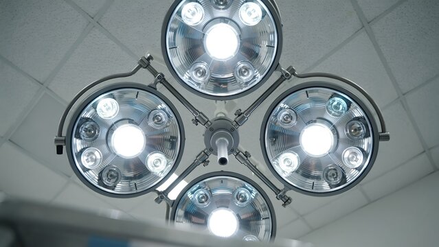 Modern Overhead Surgical Light Fixture with Multiple LED Bulbs in Operating Room