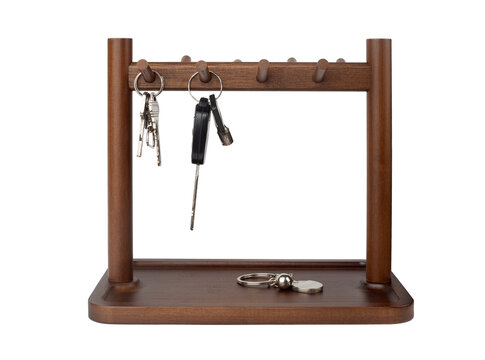 Wooden key holder rack with hooks and tray isolated on white background