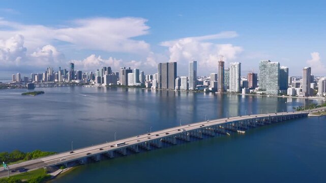 Aerial view of the Julia Tuttle Causeway spanning Biscayne Bay with the Miami skyline in the background, Miami, Florida, United States.