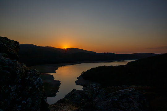 Sunset during the solar eclipse at Embalse del Arl