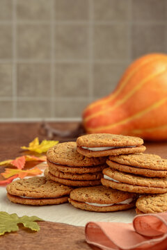 oatmeal pumpkin spice whoopie cookies on parchment paper