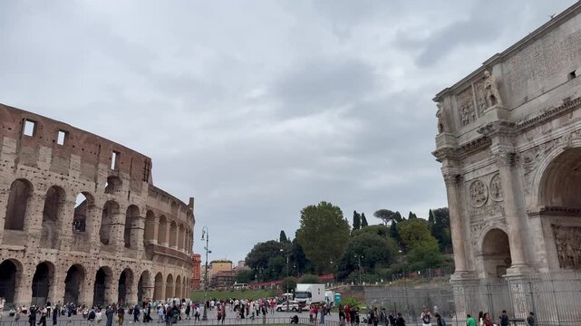 Colosseum and Arch of Constantine on a Cloudy Day in Rome, Italy