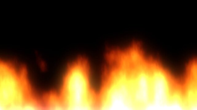 Wide wall of roaring fire burning along the bottom of a black background, its bright white hot base rising into yellow, orange and dark red flickering flames with an empty void overhead