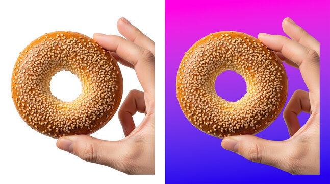 Hands holding sesame seed bagel doughnut close up