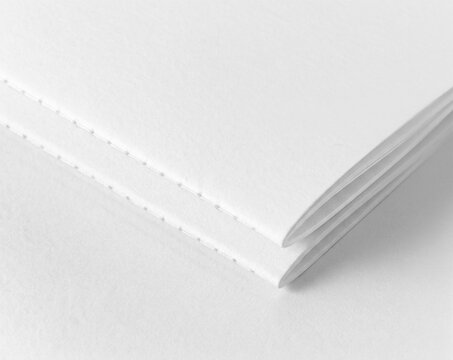 White Stitched Brochure Close Up Mockup for Editorial and Print Design